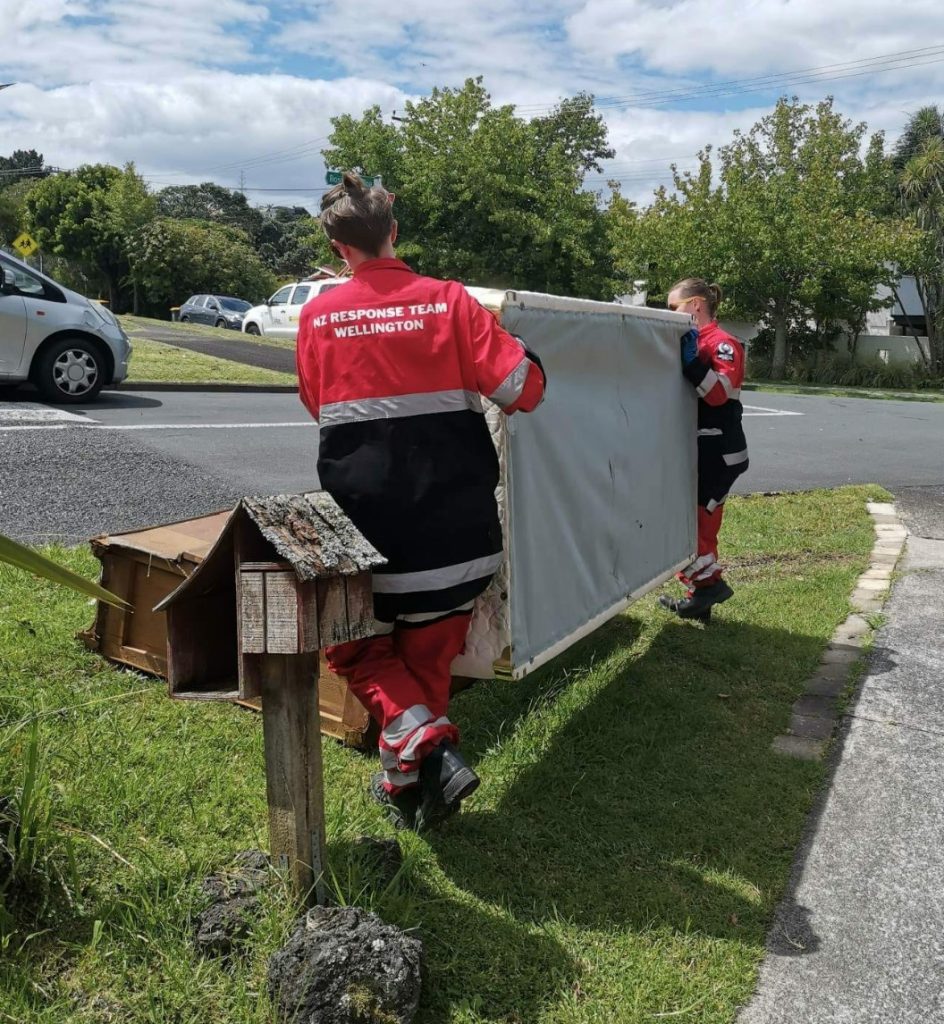 Soggy beds and mattrasses being removed from an Auckland house